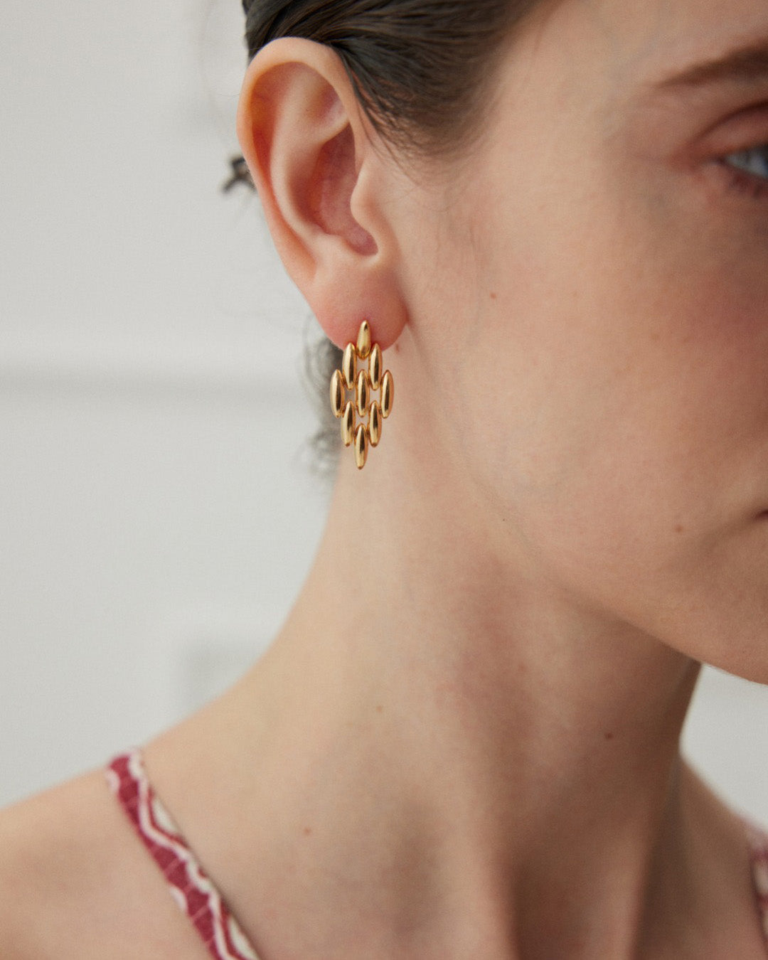 Gold Puffed Ovals Drop Earrings