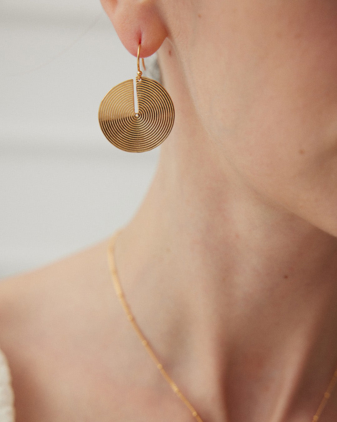 Spiral Symphony Drop Earrings in Gold