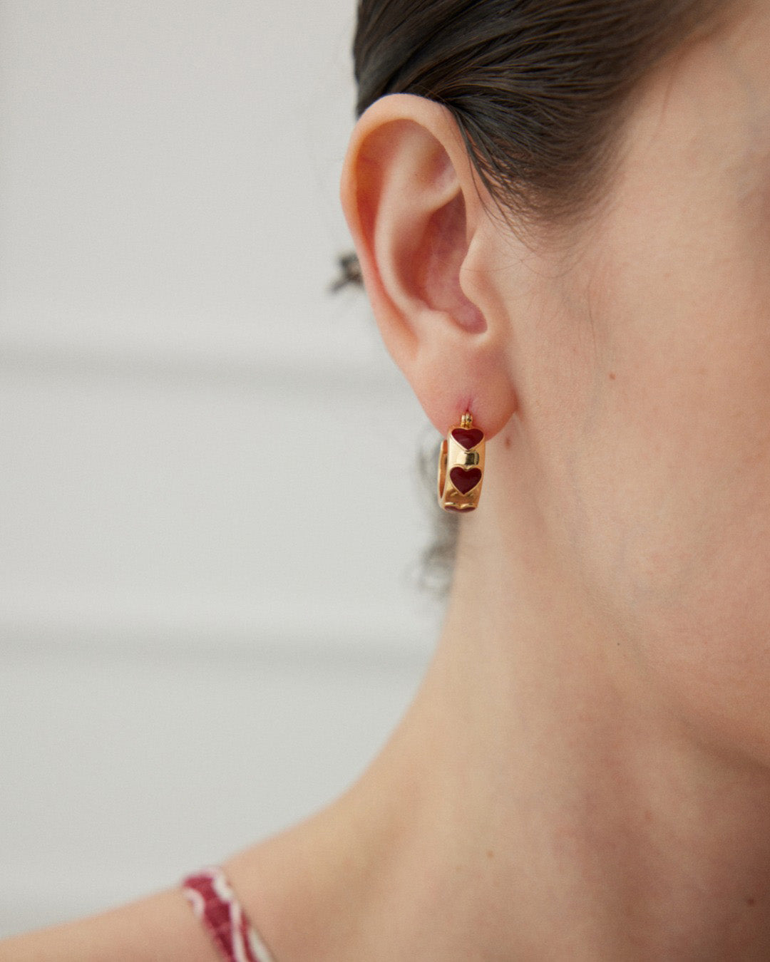 Eternal Love Huggie Earrings in Gold